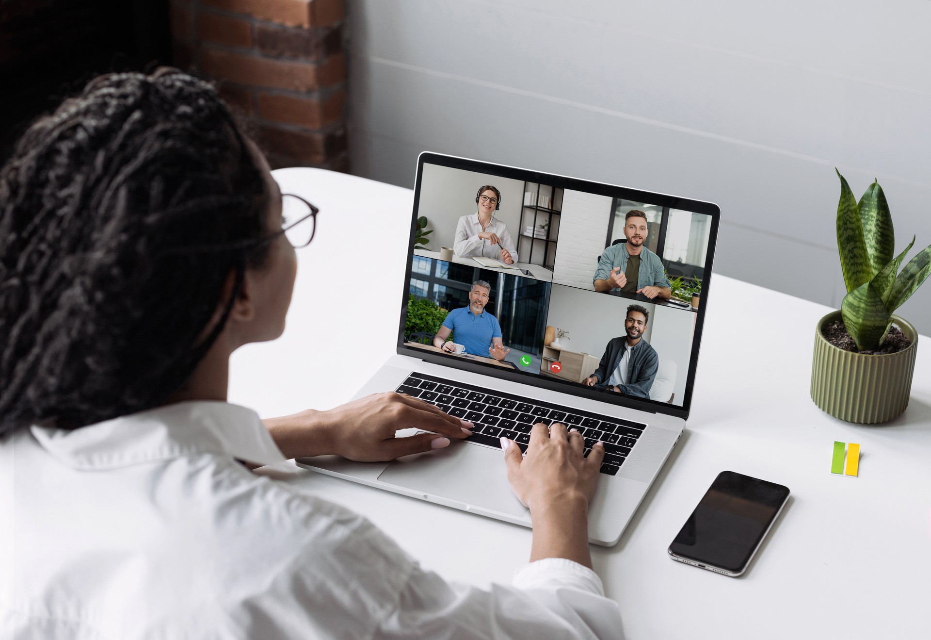 Business woman have meeting online, video conferencing chat with multi-ethnic group of people