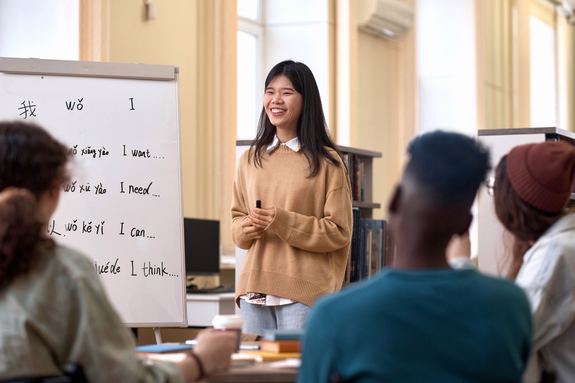 Asian Woman Teaching Chinese Language
